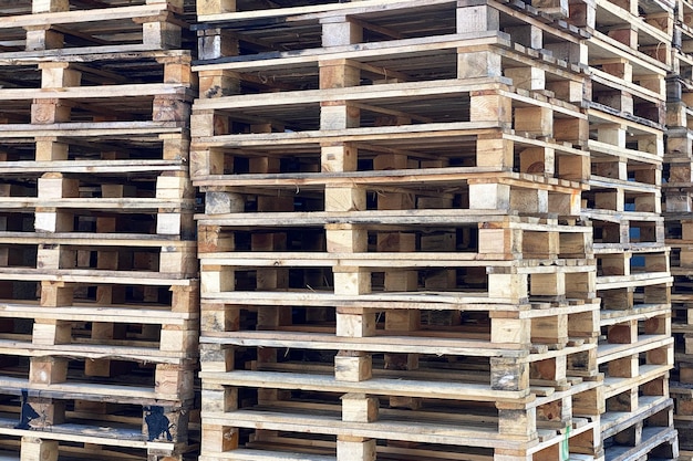 Big bunch of used wooden cargo pallets