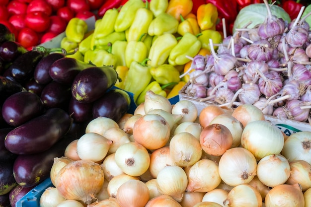 Big choice of fresh fruits and vegetables on market counter