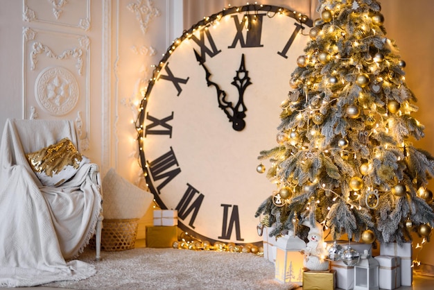 Big Clock Shows 12 o39clock Christmas Tree with Golden Lights White Molding on Wall