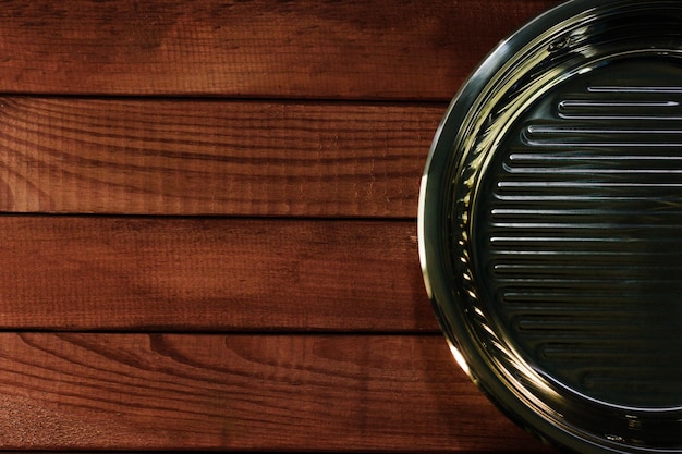 Big frying pan on the table background