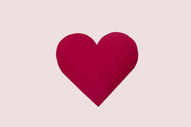 Big red heart made of paper on a white background isolate. Valentines day card blank copy