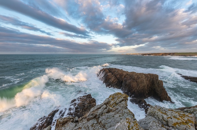 Big waves on the shores of Galicia at sunset on a winter day