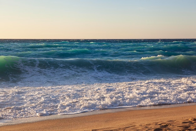 Big waves stormy sea sandy beach in Lefkada island of Grecce