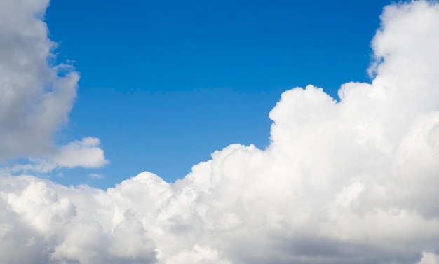 Big white fluffy clouds flying