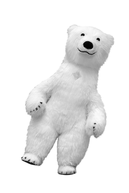 Big white polar bear isolated on white background. Life-size puppet made of fur.