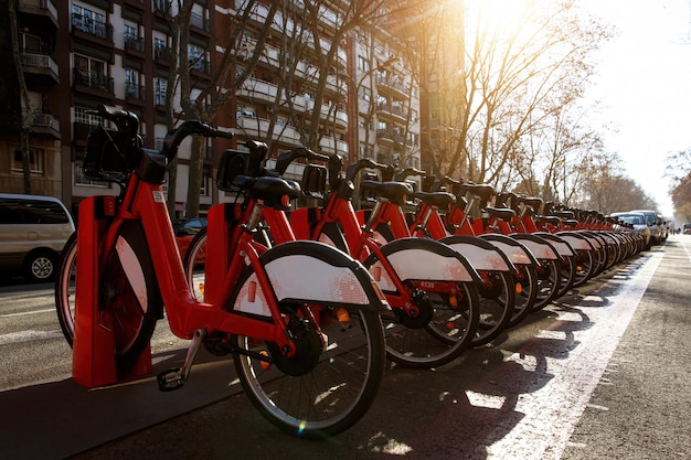 Photo bike rental city station a lot of bikes in town