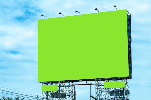 Billboard blank and blue sky, copy space on green screen