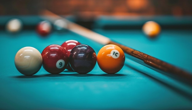 Photo billiard balls and sticks on the table