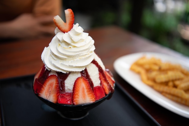 Bingsu or Bingsoo is a popular Korean dessert