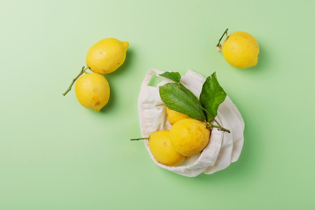 Biological lemons with green leaves