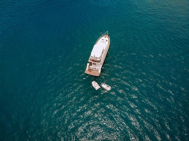 Bird eye view of the amazing white yacht in the Andaman sea; vessels concept.