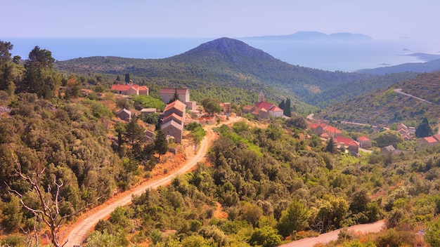 Bird view of Velo Grablje Historic village on Hvar island in Croatia famous for lavender vine and olive oil production Aerial view from an old mountain road