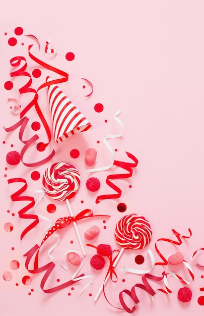 Birthday background with red and pink paper birthday decotations