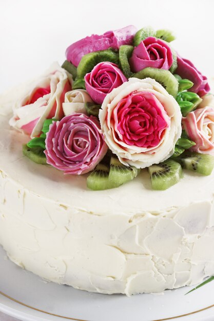 Birthday cake with flowers rose on white background