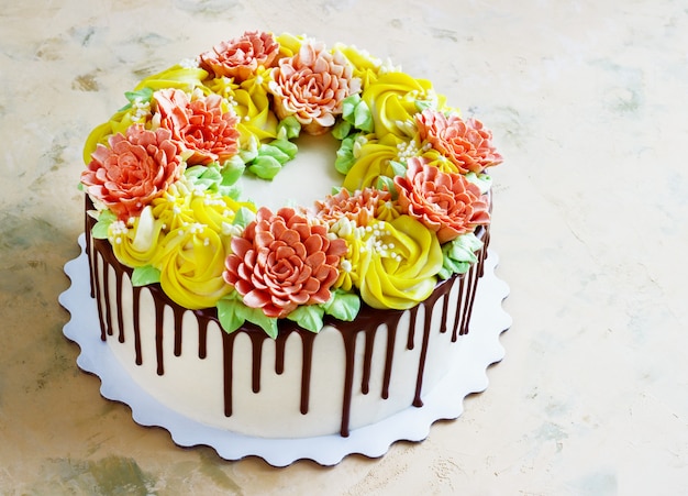 Birthday cake with flowers rose on white