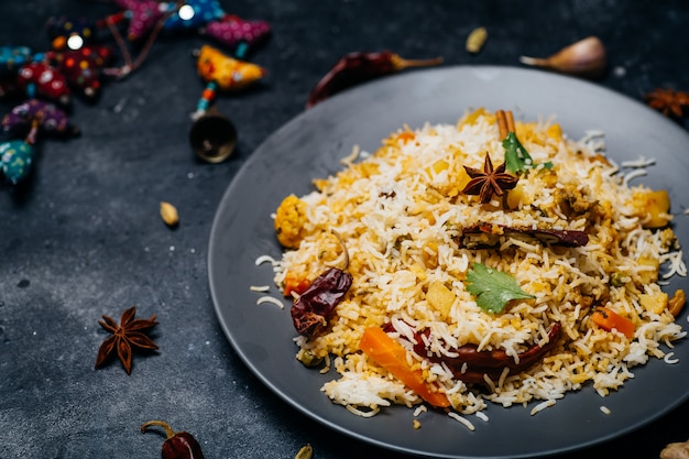 Biryani rice (Vegetable biryani). Indian basmati rice, curry vegetables and spices. Indian kitchen