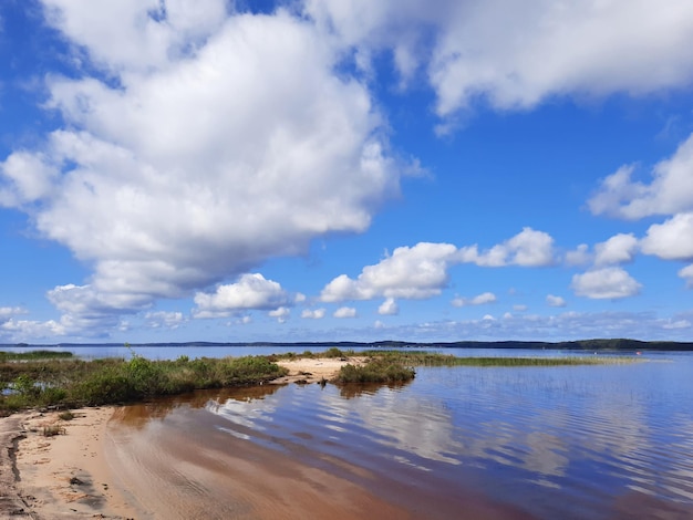 Biscarrosse sandy wild beach with blue calm water in landes france