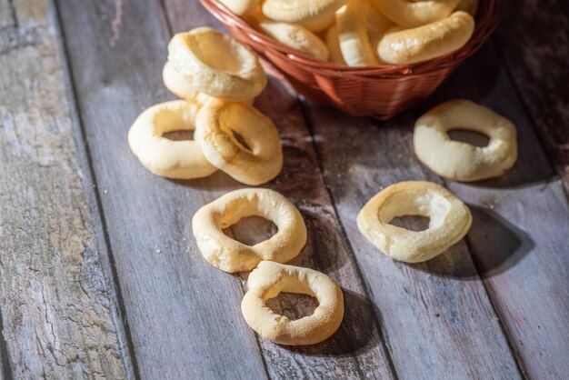 Biscuit manioc flour cookies arranged on rustic wooden surface selective focus