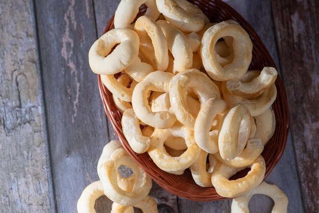 Biscuit manioc flour cookies arranged on rustic wooden surface selective focus