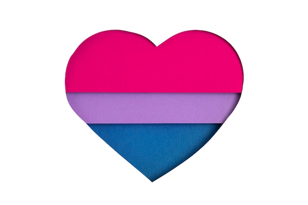 Photo bisexual flag in the form of paper cut out shape with blue, pink and violet colors. love, pride, diversity, tolerance, equality concept