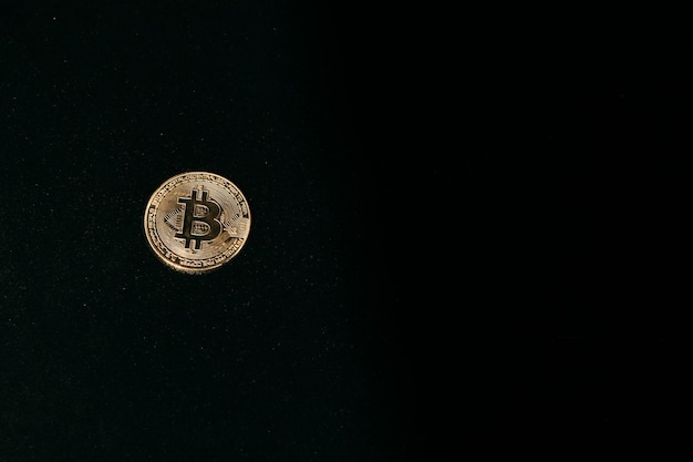 Bitcoin Golden bitcoin isolated on dark background