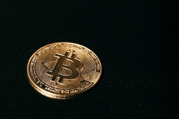 Bitcoin Golden bitcoin isolated on dark background