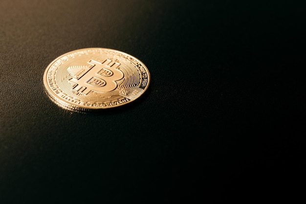 Bitcoin Golden bitcoin isolated on dark background