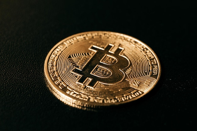 Bitcoin Golden bitcoin isolated on dark background