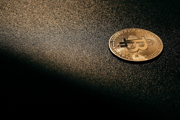 Bitcoin Golden bitcoin isolated on dark background