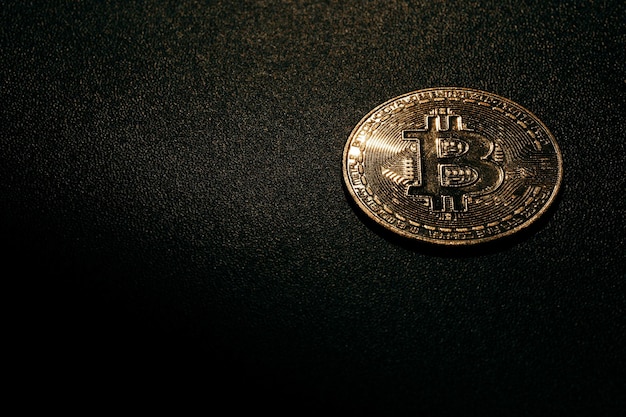 Bitcoin Golden bitcoin isolated on dark background