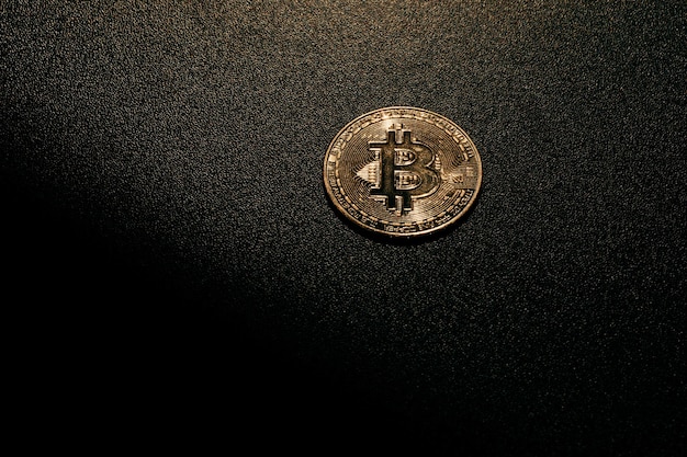 Bitcoin Golden bitcoin isolated on dark background