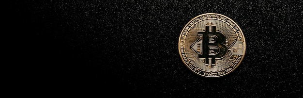 Bitcoin Golden bitcoin isolated on dark background