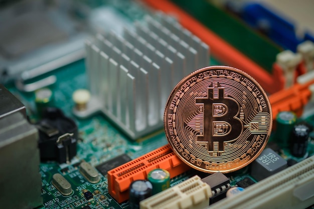 Bitcoin and integrated circuit on backgroundconcept of finance and technology