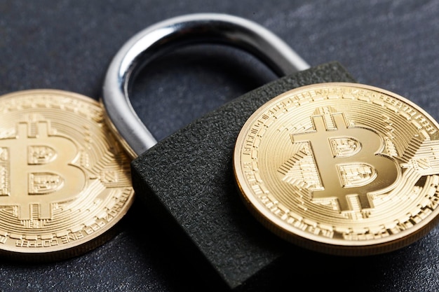 Bitcoin security concept Gold coin with padlock