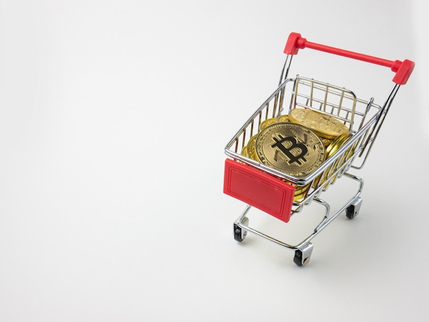 The bitcoin on shopping cart for cryptocurrency or technology concept