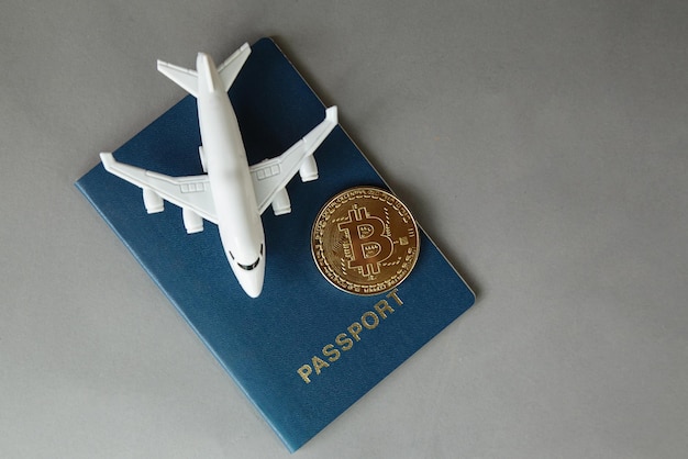 Bitcoin with aeroplane passport Cryptocurrency Business concept