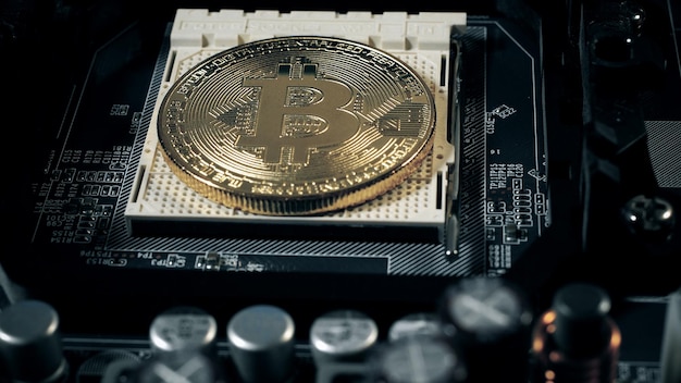 Bitcoins on the motherboard. Crypto currency Gold Bitcoin - BTC - Bit Coin.