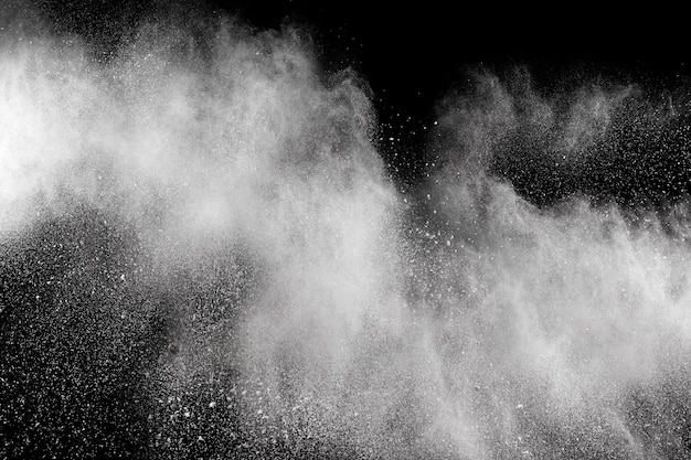 Bizarre forms of  white powder explosion cloud against dark background. 