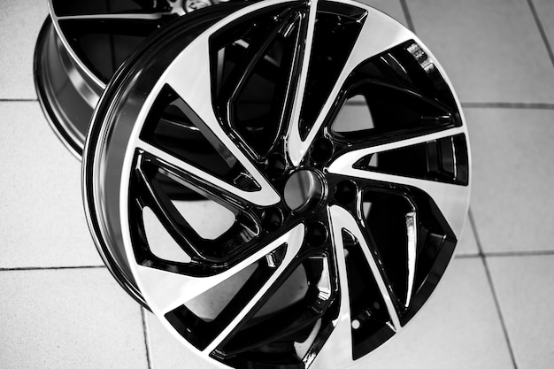 Black alloy wheels on a car closeup purchase and replacement of autodisks