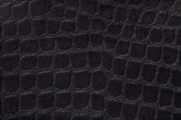 Black background from a soft upholstery textile material