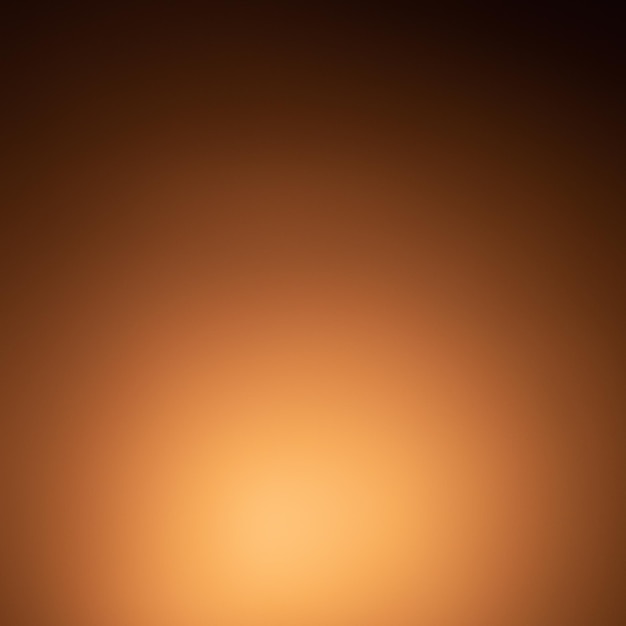 The black background is circled with warm orange hues