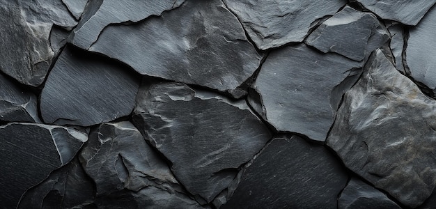 Black background with a dark gray stone texture