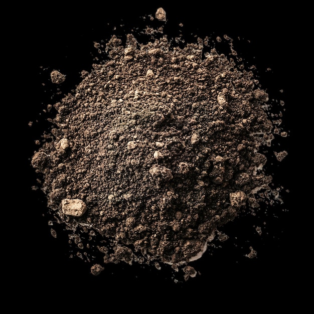 a black background with a dusted nut and dust