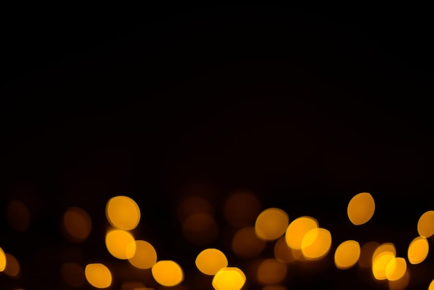 Black background with golden bokeh effect