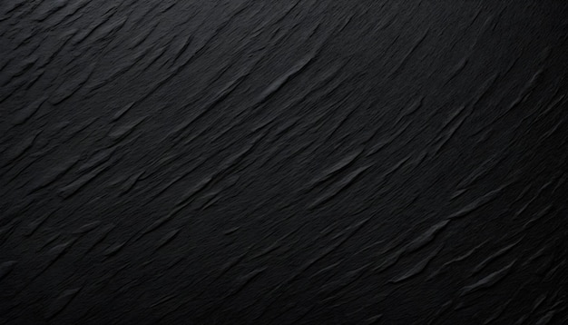 A black background with a grainy rough texture reminiscent of charcoal or stone