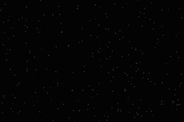 Photo a black background with stars in the night sky