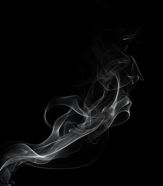 a black background with white smoke in the middle