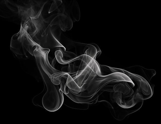 a black background with white smoke in the middle