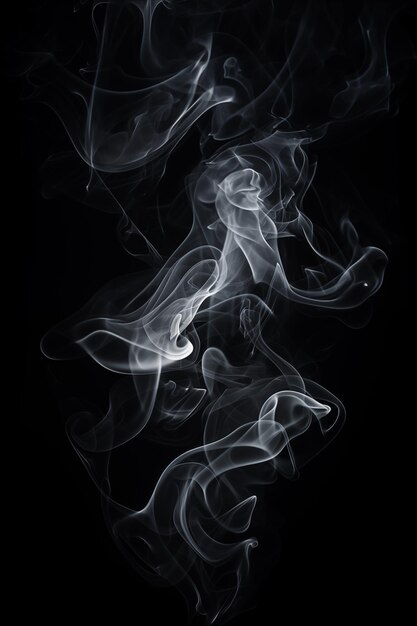 a black background with white smoke in the middle