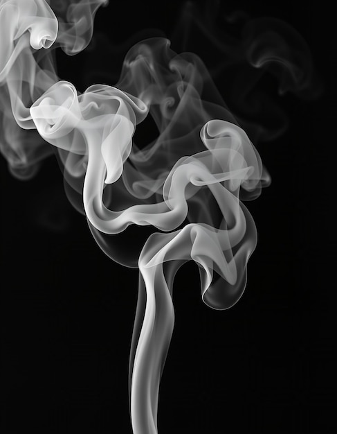 a black background with a white smoke in the middle